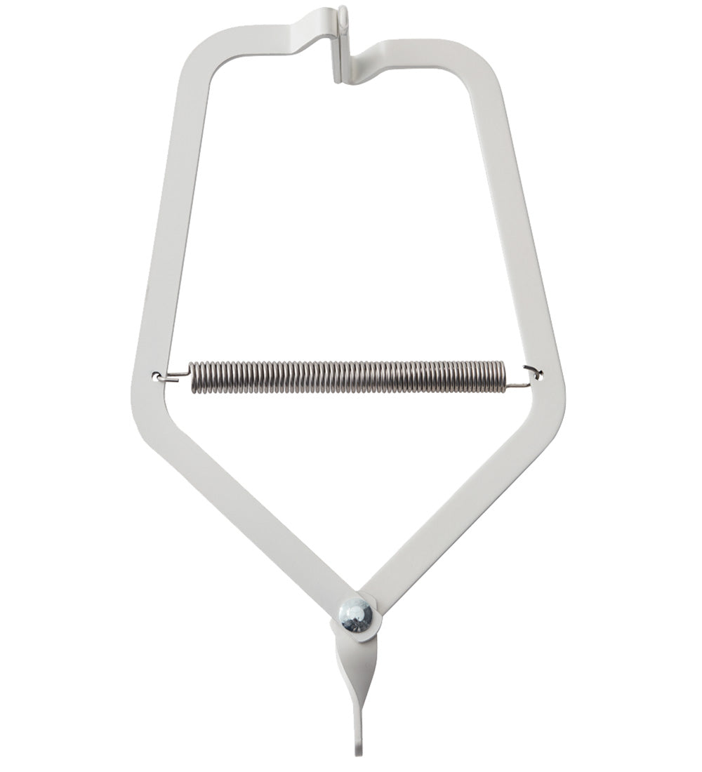 Dverový úchyt na kolísku kovový biely